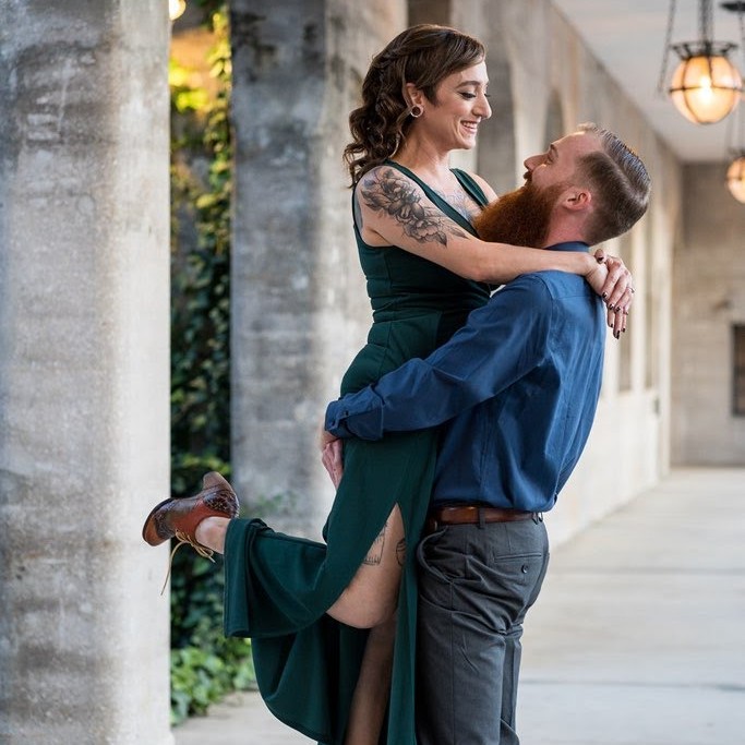 engaged couple dancing